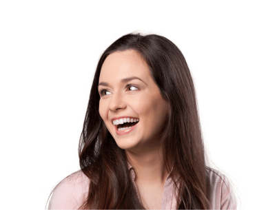 Woman smiling brightly, representing patient satisfaction at our Bellevue dental practice.
